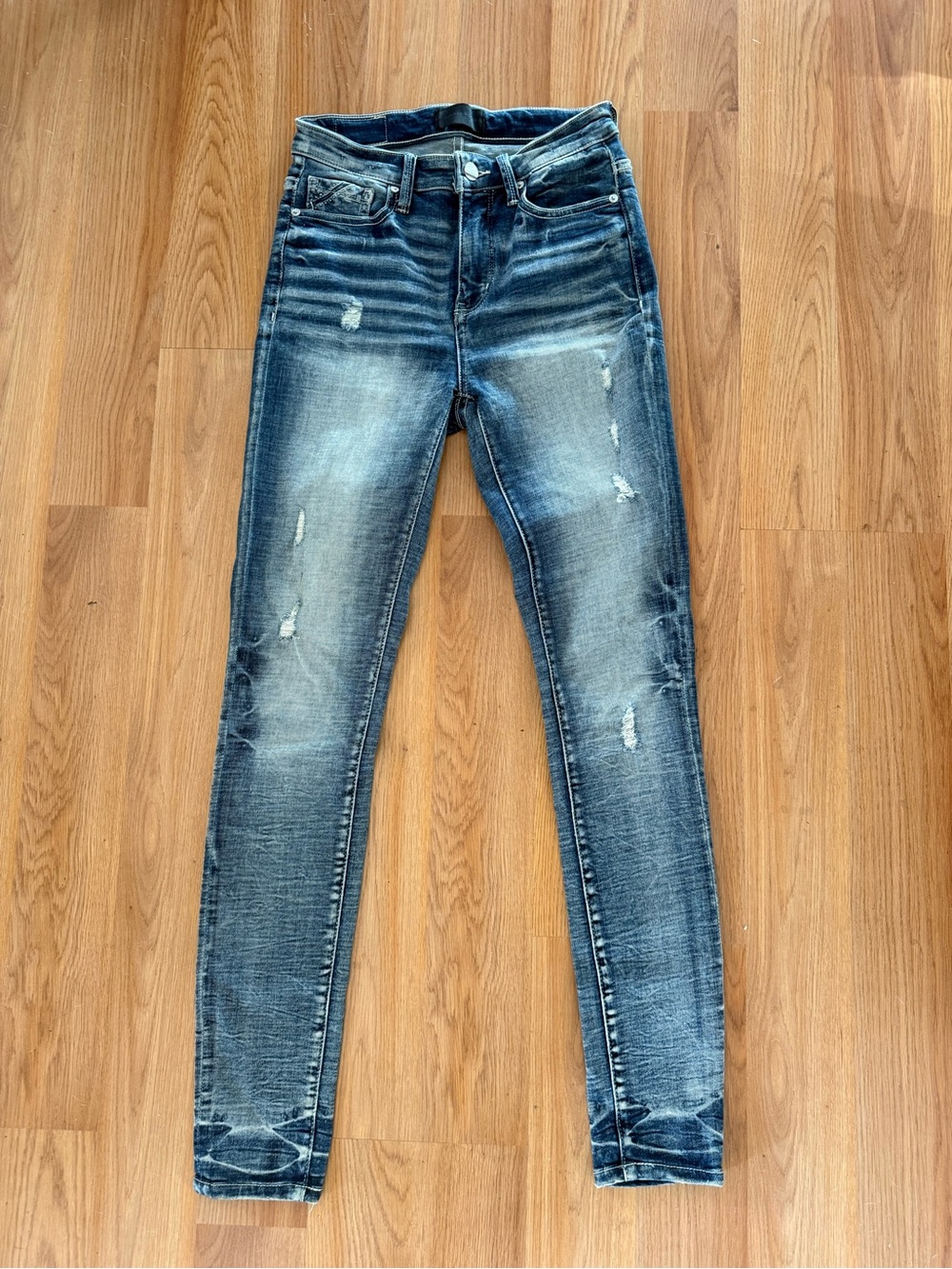 Buckle black distressed skinny jeans size 24